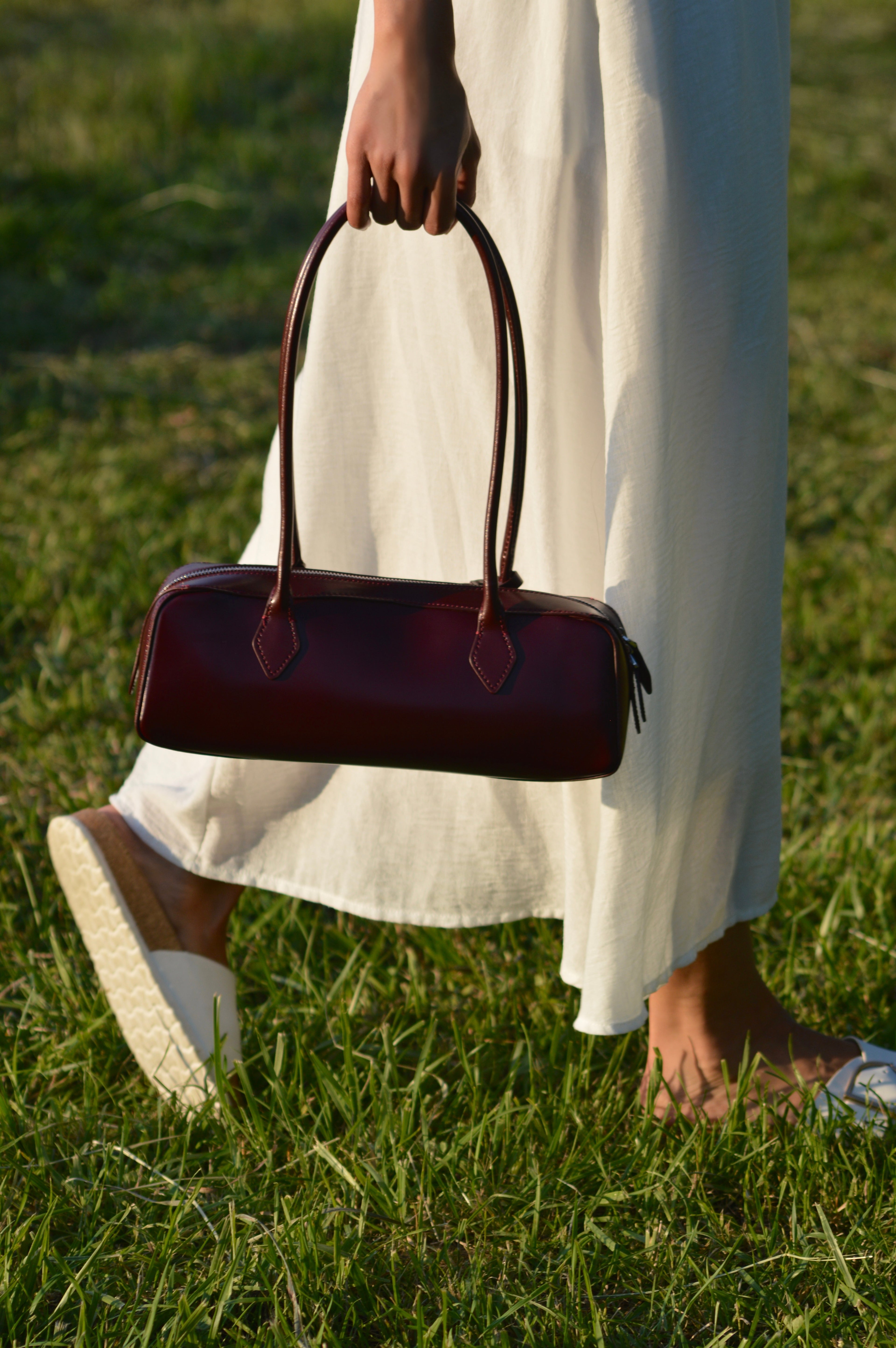 burgundy shoulder and handbag