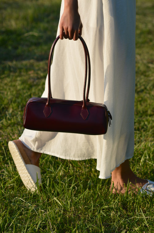 burgundy shoulder and handbag